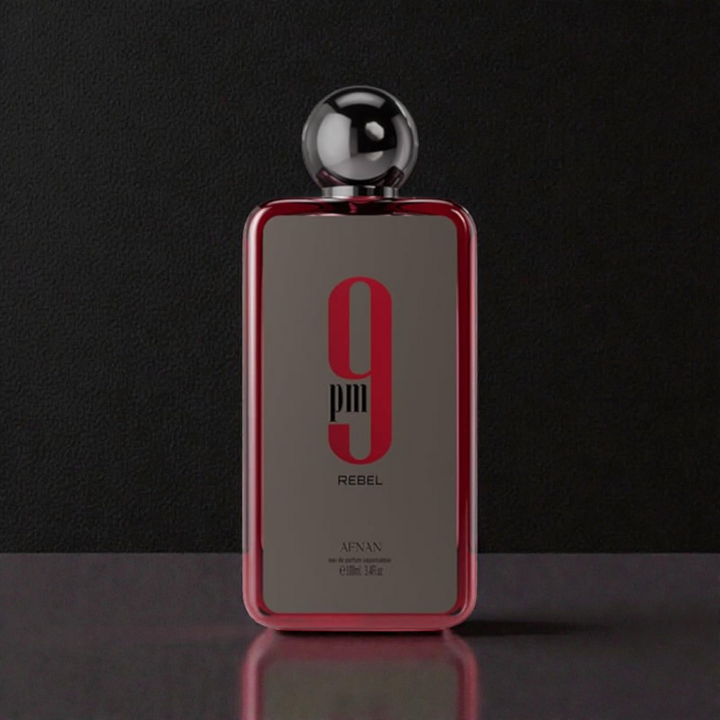 9 PM Rebel Afnan EDP: El Cautivador Perfume Unisex de Piña, Vainilla y Caramelo. ¡El Lujo de la Rebeldía!