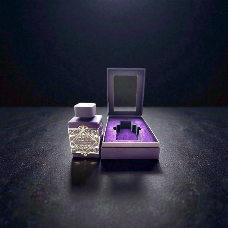 Lattafa Bade'e Al Oud Amethyst EDP: Rosa, Oud, Pimienta Negra y Vainilla. ¡El Lujo Púrpura de Oriente!